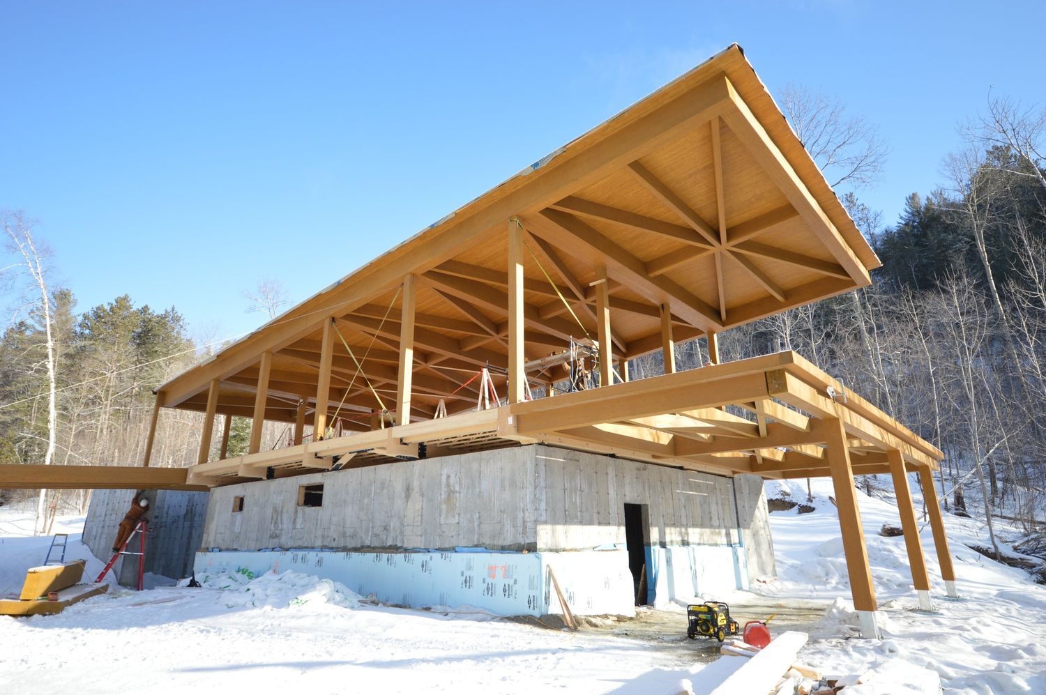 Construcción de interiores de casas de un proyecto de tipo Estructuras de madera laminada cerca de Abitibi-Témiscamingue por Ambiance Bois Structure