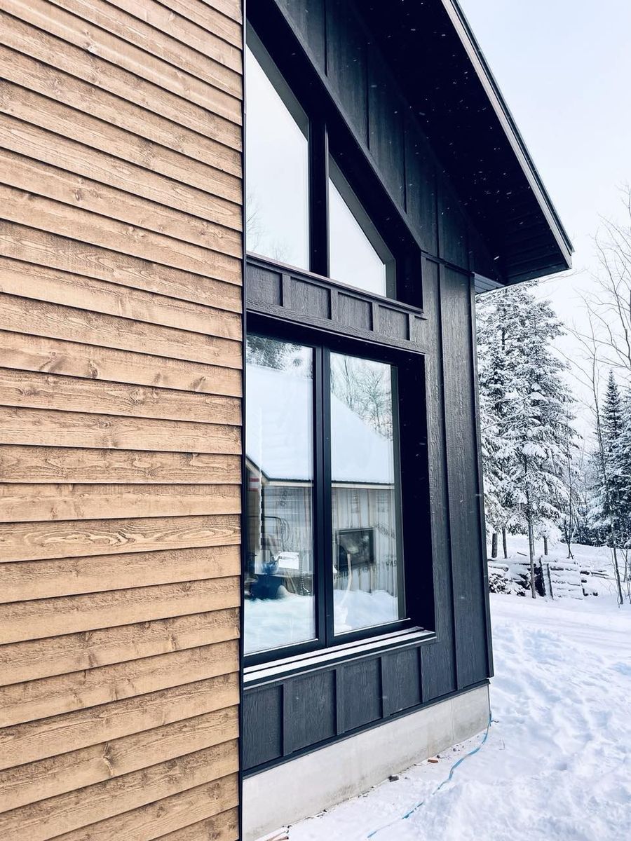 Exterior Finishes from a Single family homes project near Rimouski (Bas-Saint-Laurent) by ORIGINE Écoconstruction inc.