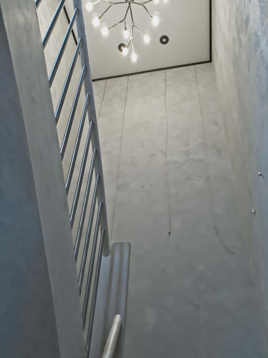 Staircase from a Natural plasters project near Montreal (Greater Montreal) by Distribution Tockay inc.