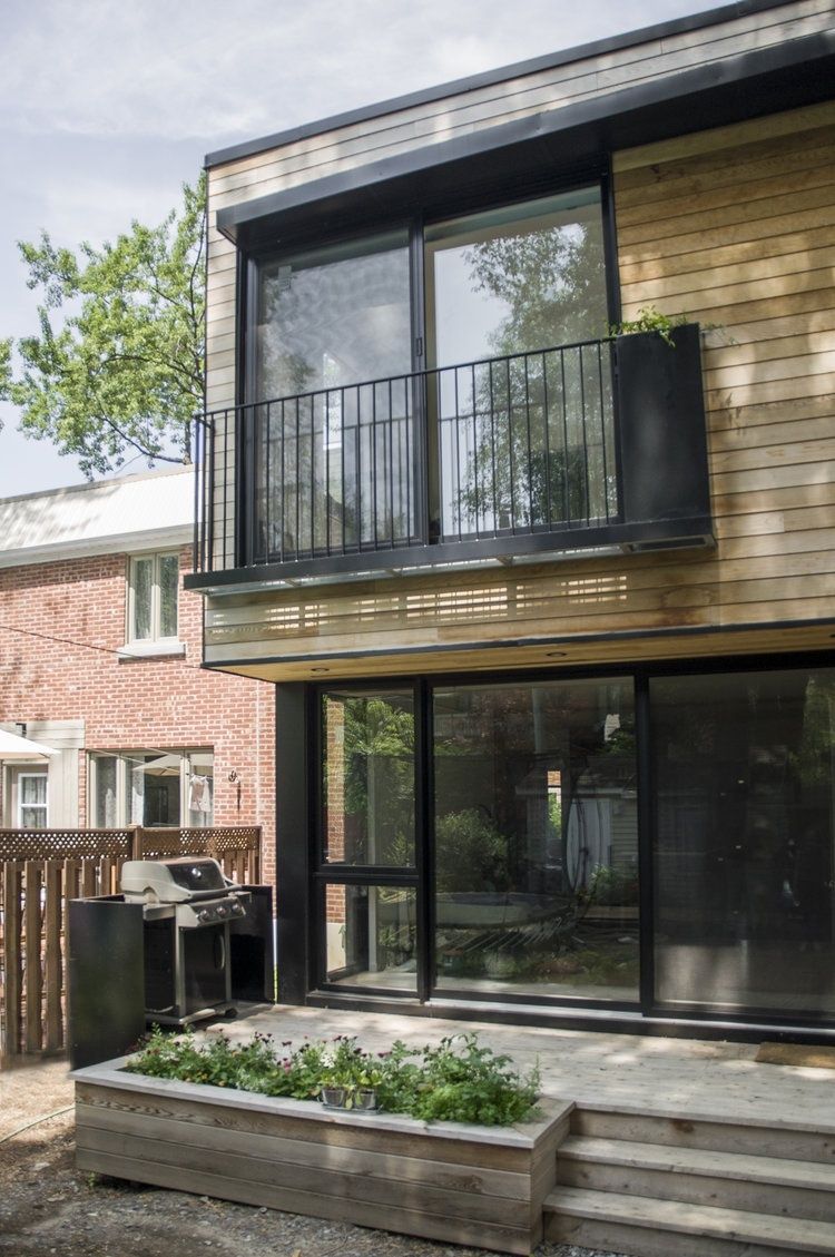 Patio trasero de un proyecto de tipo Ampliaciones del hogar cerca de Montreal (Gran Montreal) por Rose Architecture