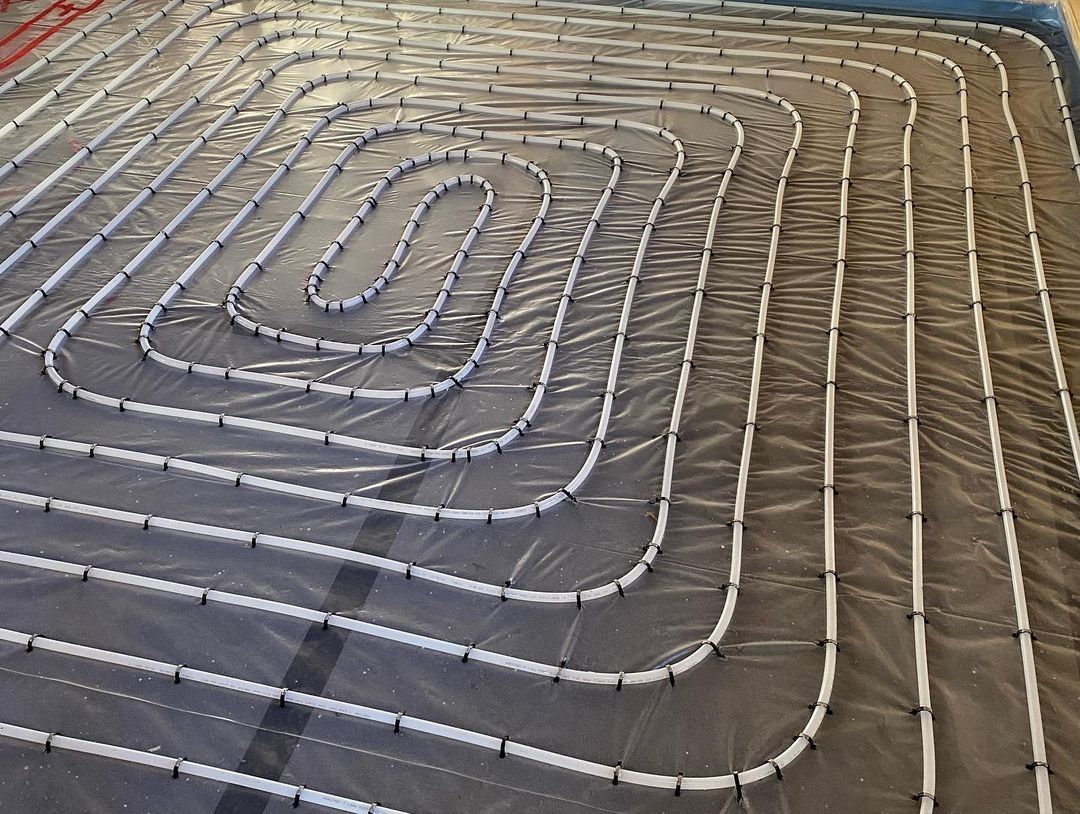 Building mechanicals from a Hydronic Radiant Floor Heating project near New York-Newark-Jersey City by Next Level Underfloor Heating and Screed Solutions
