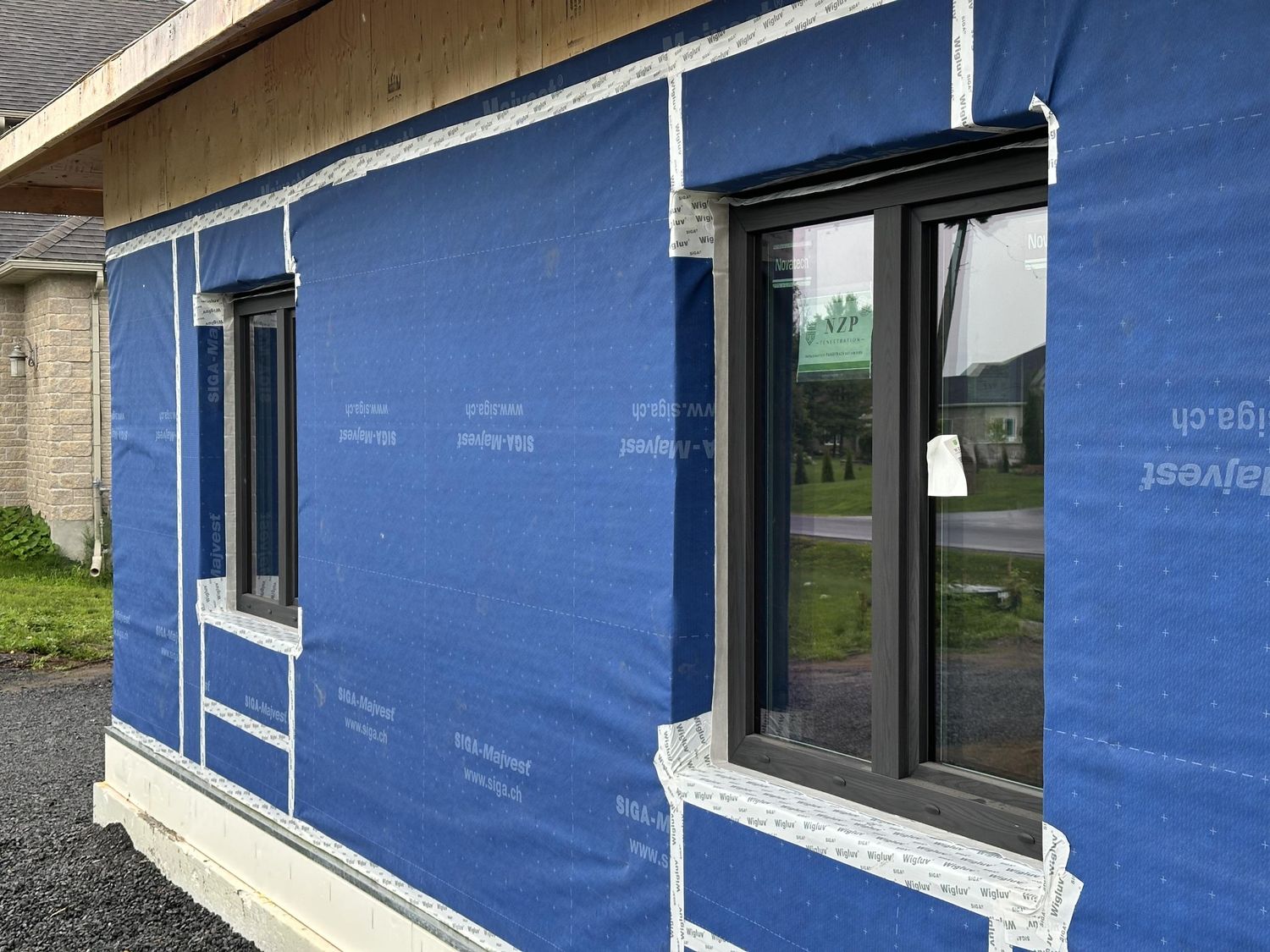 Construcción de exteriores de casas de un proyecto de tipo Viviendas unifamiliares cerca de Montreal (Gran Montreal) por Retrofit Construction