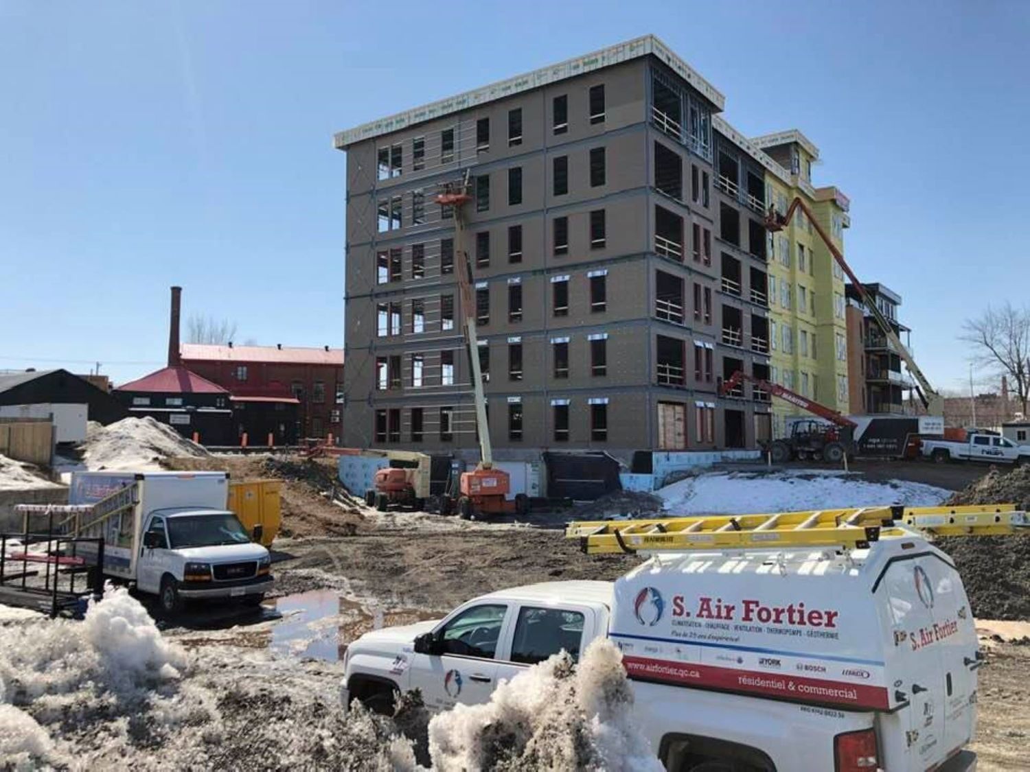 House Construction Exteriors from a Multi-family and high-rise Buildings project near Saint-Jean-sur-Richelieu (Montérégie) by S. Air Fortier