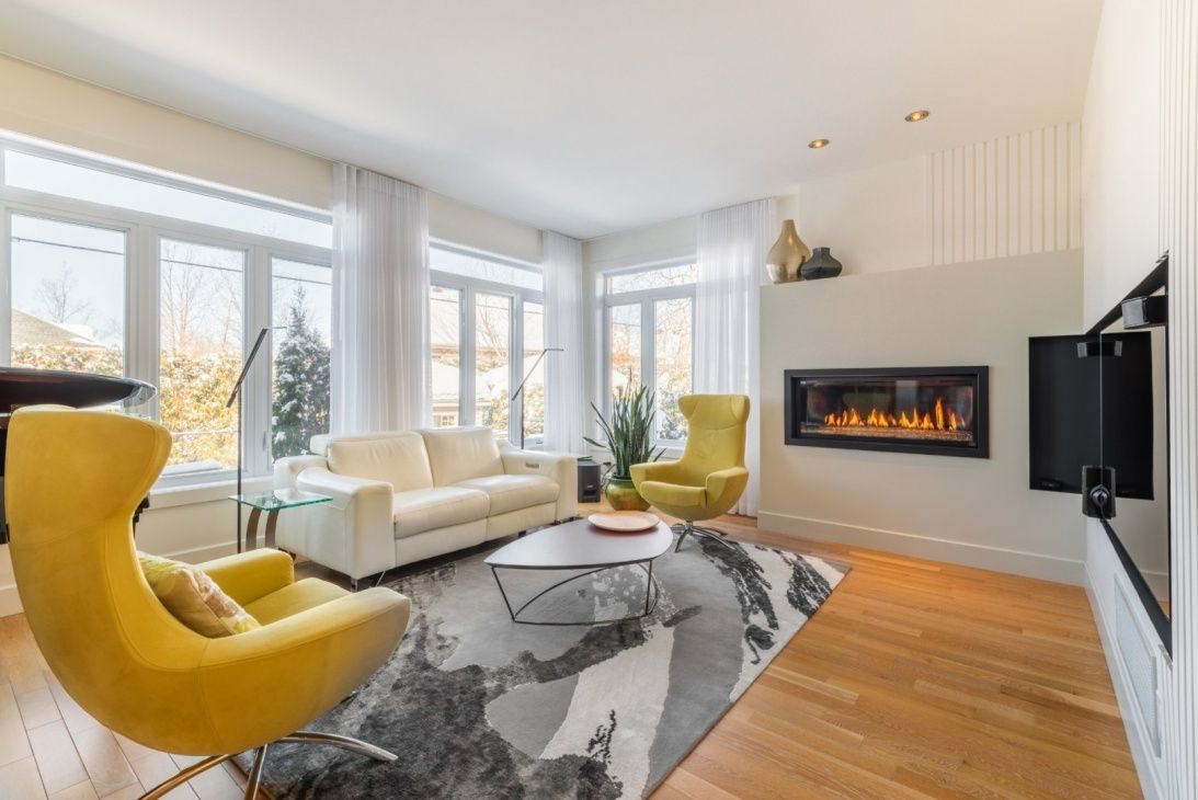 Sala de un proyecto de tipo Viviendas unifamiliares cerca de Montreal (Gran Montreal) por D.SAINT design