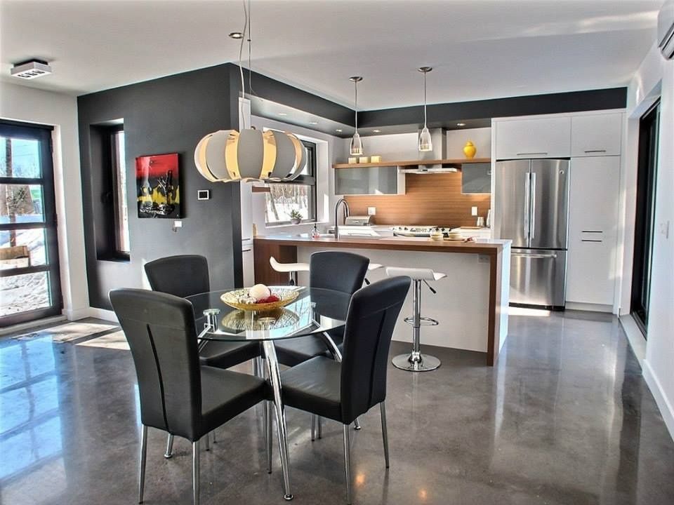Comedor de un proyecto de tipo Desarrollos inmobiliarios cerca de Trois-Rivières (Mauricie) por Écodomaine des Forges