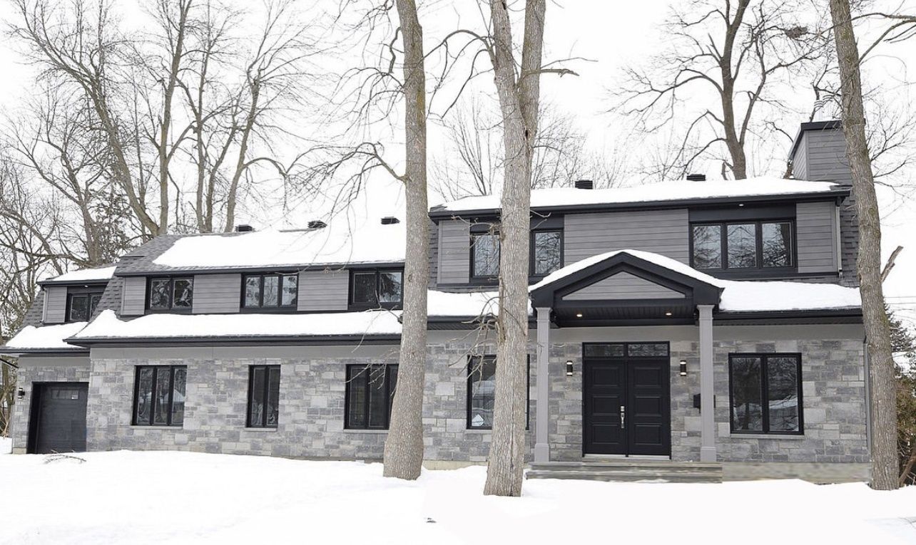 Fachada frontal de un proyecto de tipo Viviendas unifamiliares cerca de Montreal (Gran Montreal) por Construction VERTicale