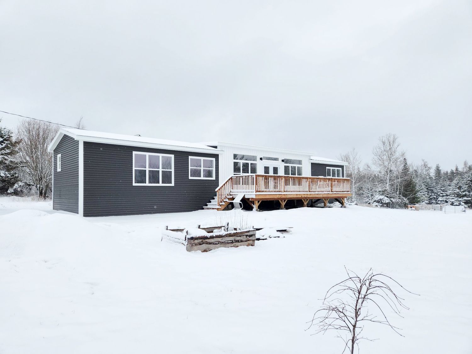Backyard from a Prefab and Modular Houses project near Halifax by The Home Centre