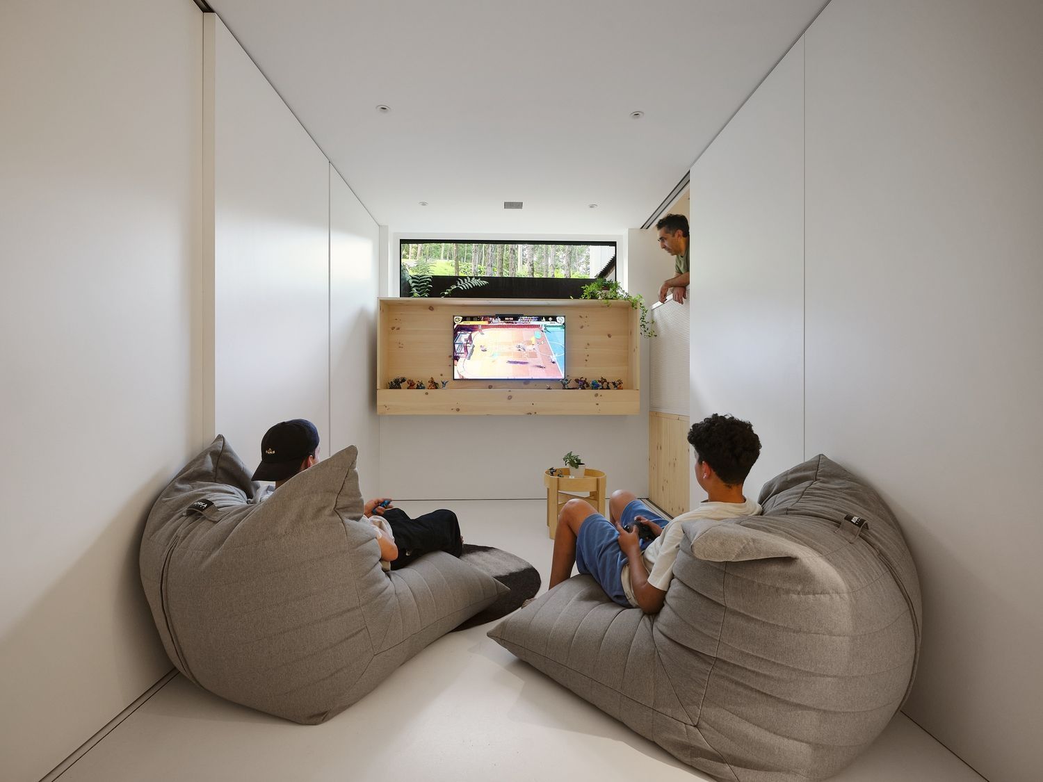 Family Room from a Single family homes project near Sherbrooke (Estrie) by Stroph Architecture & Design