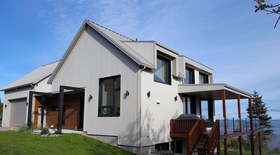 House Exterior from a Single family homes project near Quebec City - Levis by TERGOS Architecture + Construction