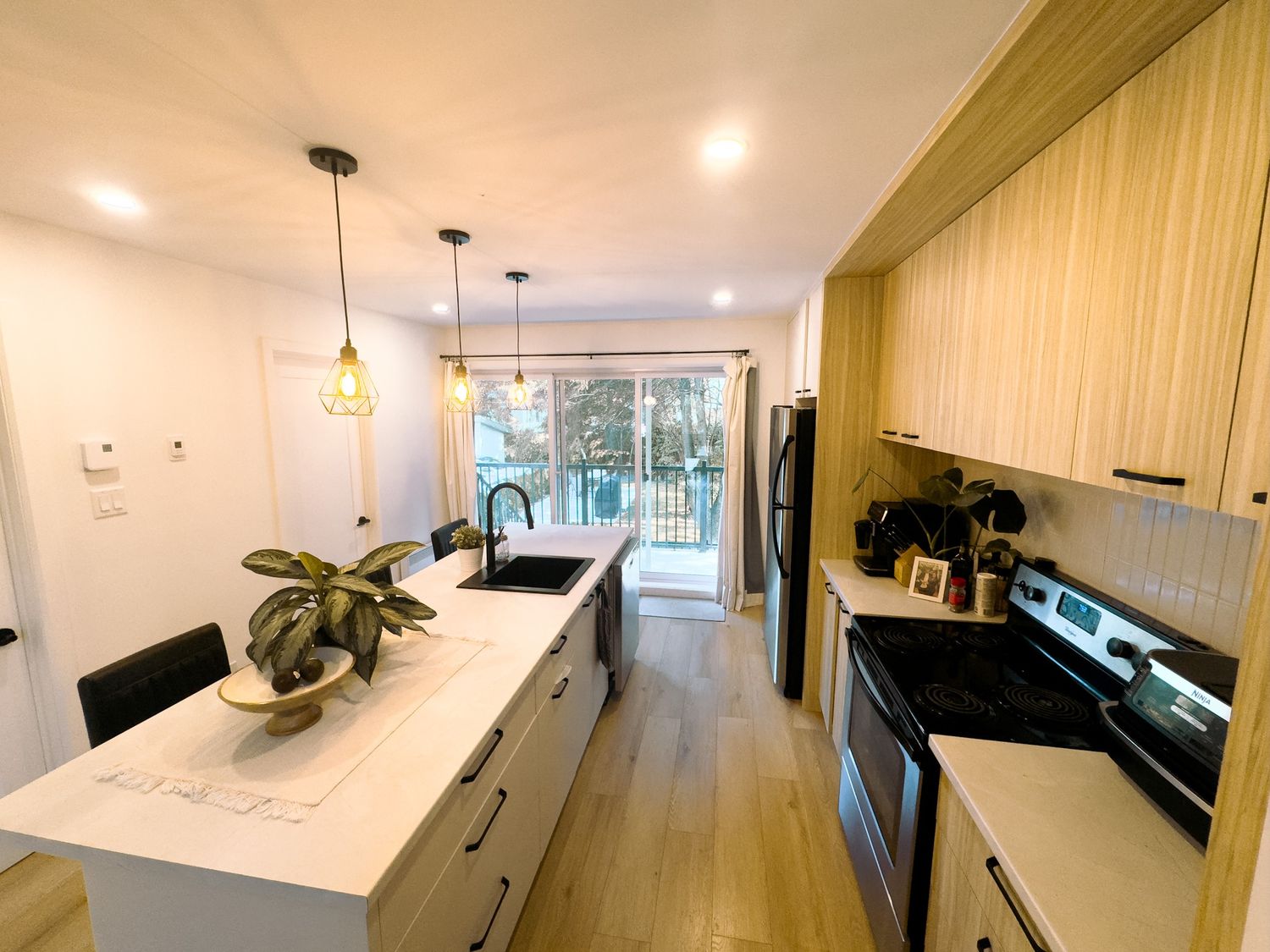 Kitchen from a Multi-family and high-rise Buildings project near Quebec City - Levis by Groupe Habitech