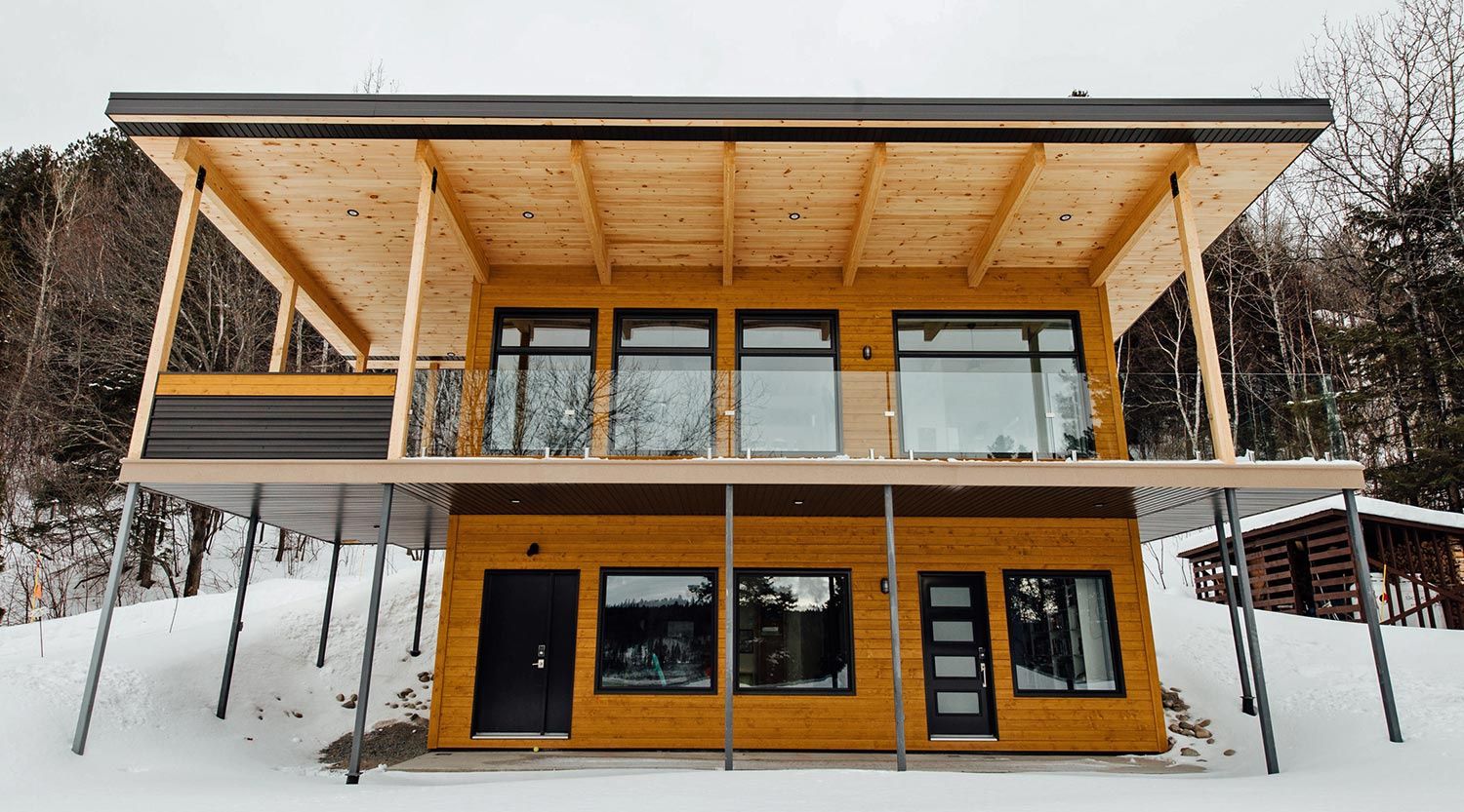 Façade avant d'un projet de Maisons unifamiliales près de Saguenay/Lac-Saint-Jean de Le Mur Porteur | Coopérative de travail