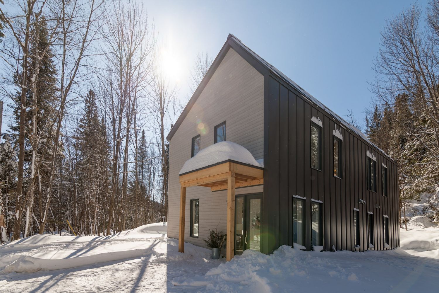 Façade avant d'un projet de Maisons unifamiliales près de Saint-Jérôme/Blainville (Laurentides) de Biophile architecture
