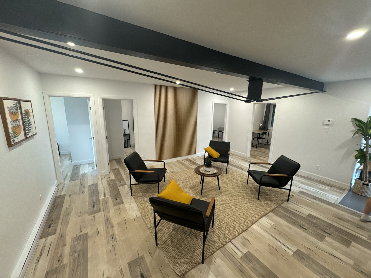 Salón familiar de un proyecto de tipo Edificios de departamentos y rascacielos cerca de Ciudad de Quebec - Lévis por Groupe Habitech