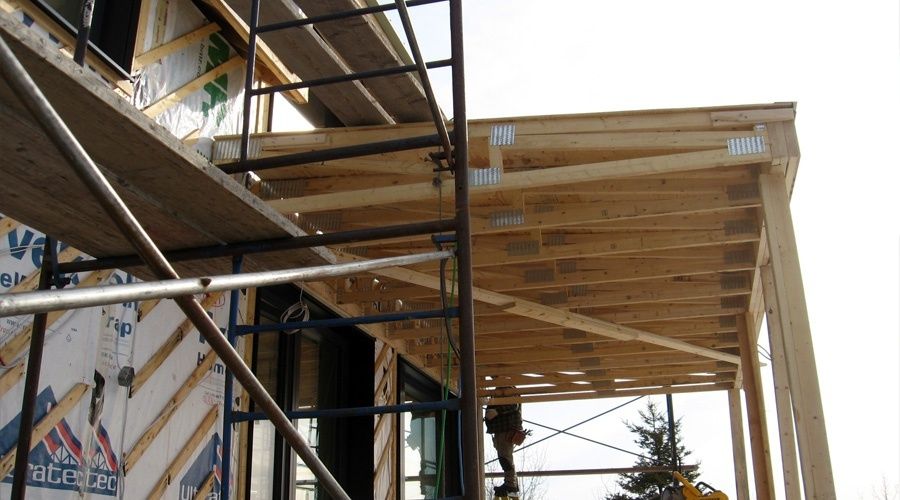 Construcción de exteriores de casas de un proyecto de tipo Viviendas unifamiliares cerca de Ciudad de Quebec - Lévis por TERGOS Architecture et Construction