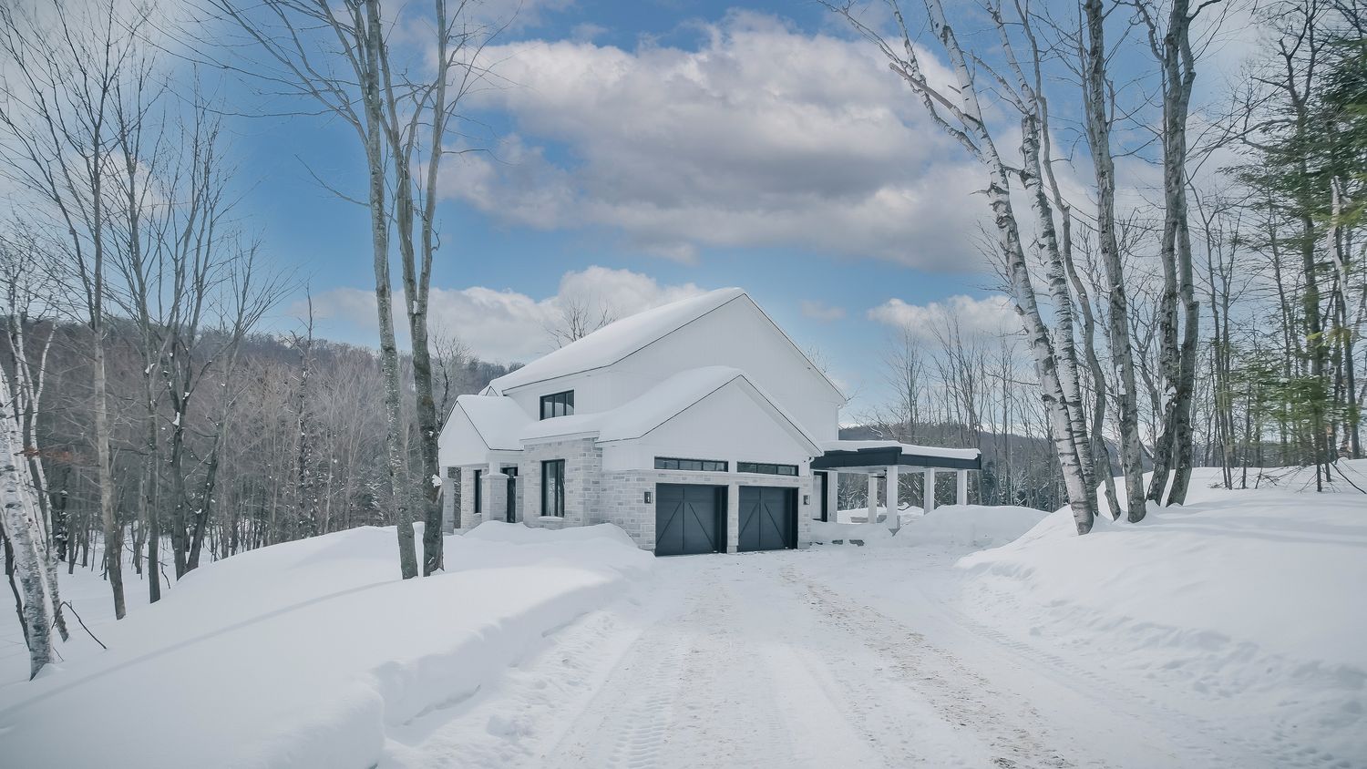 House Exterior from a Single family homes project near Saint-Jerome (Laurentides) by Les Constructions Raymond et Fils