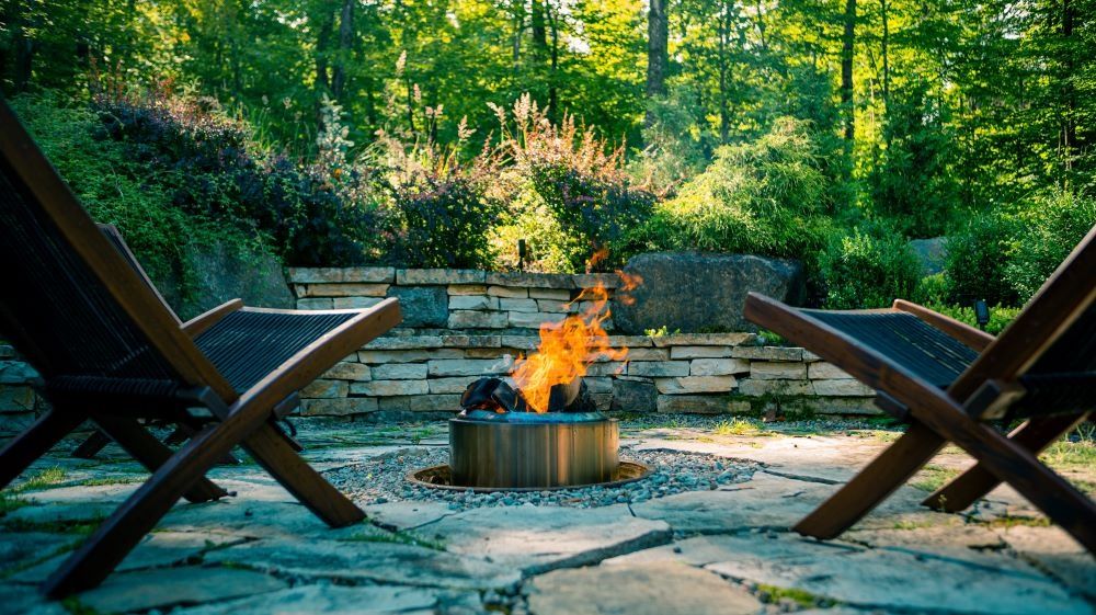 Backyard from a Landscaping around a pool project near Quebec City - Levis by Repères