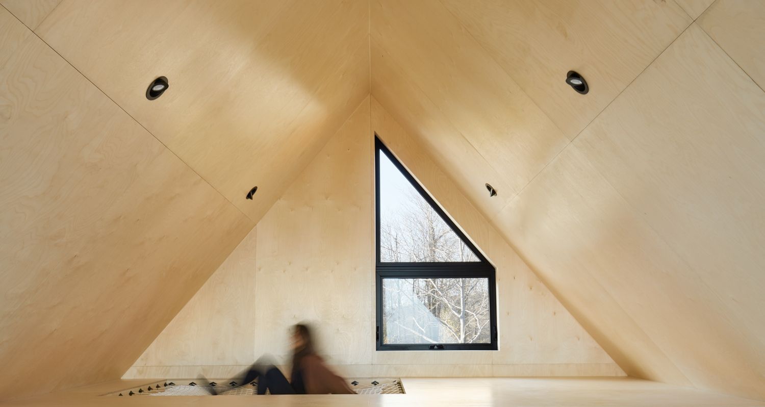 Salle familiale d'un projet de Maisons unifamiliales près de Granby/Bromont/Cowansville (Estrie) de Écorce architecture écologique