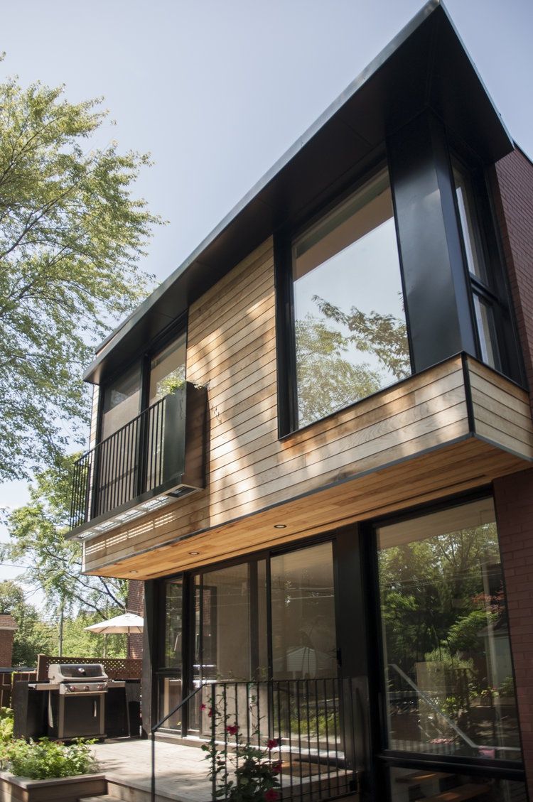 Cour arrière d'un projet de Agrandissements de maison près de Montréal/Laval/Longueuil (Grand Montréal) de Rose Architecture