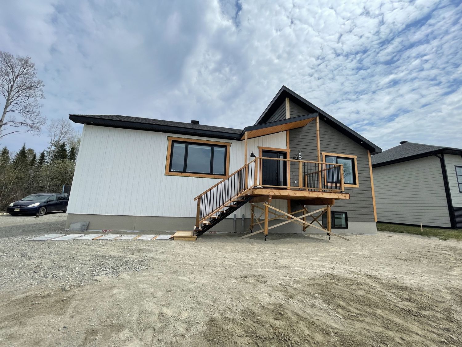 Construcción de exteriores de casas de un proyecto de tipo Viviendas unifamiliares cerca de Abitibi-Témiscamingue por Constructions Rivard Inc.