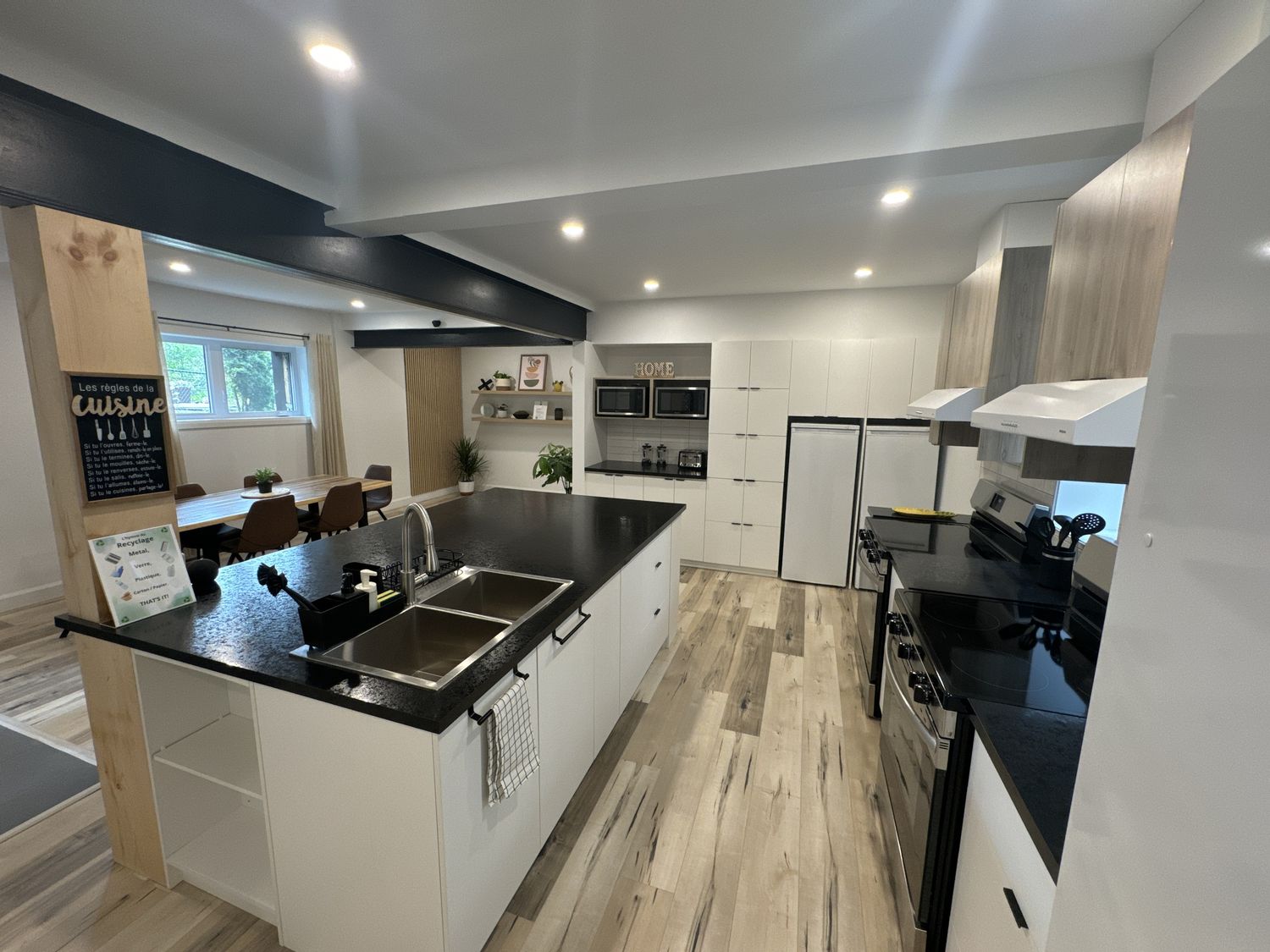 Cocina de un proyecto de tipo Edificios de departamentos y rascacielos cerca de Ciudad de Quebec - Lévis por Groupe Habitech