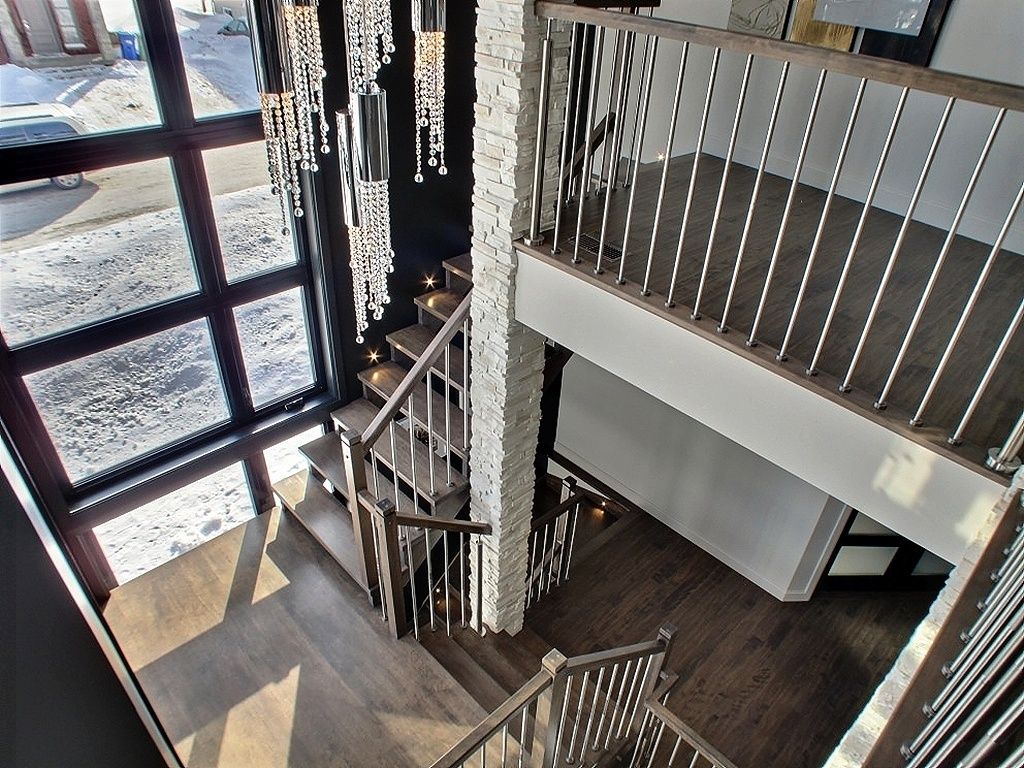 Escaleras de un proyecto de tipo Viviendas unifamiliares cerca de Ciudad de Quebec - Lévis por TEKpur Architecture