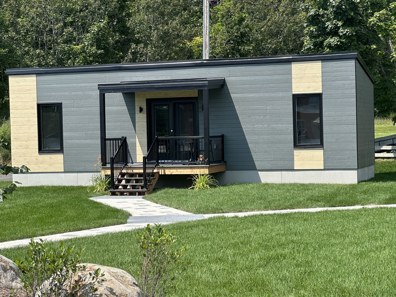 House Exterior from a Tiny Houses project near Quebec City - Levis by construction rosaire guay et fils inc