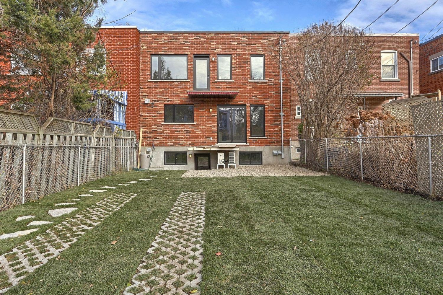 Backyard from a Removal of load bearing walls project near Montreal (Greater Montreal) by Les Constructions du Patrimoine J.S. INC.