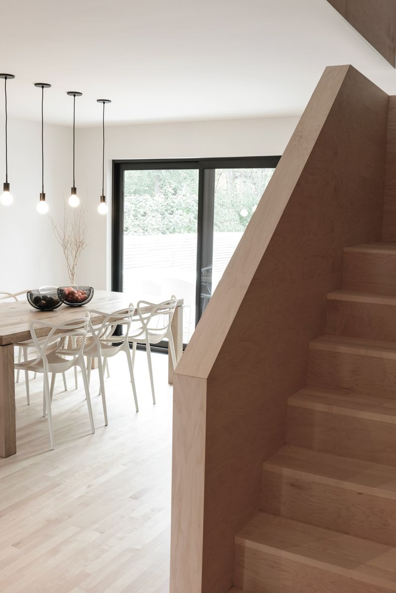 Comedor de un proyecto de tipo Viviendas unifamiliares cerca de Montreal (Gran Montreal) por Stroph Architecture & Design