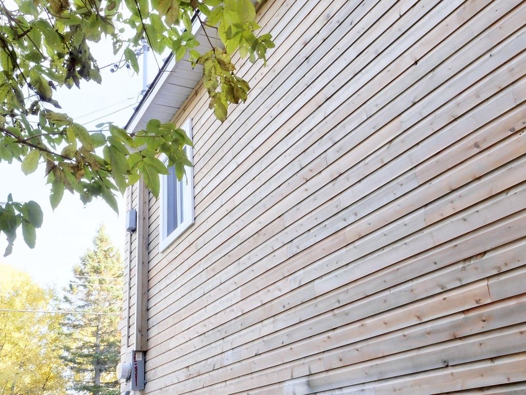 Exterior Finishes from a Single family homes project near Rimouski (Bas-Saint-Laurent) by La Couverte Construction Communautaire