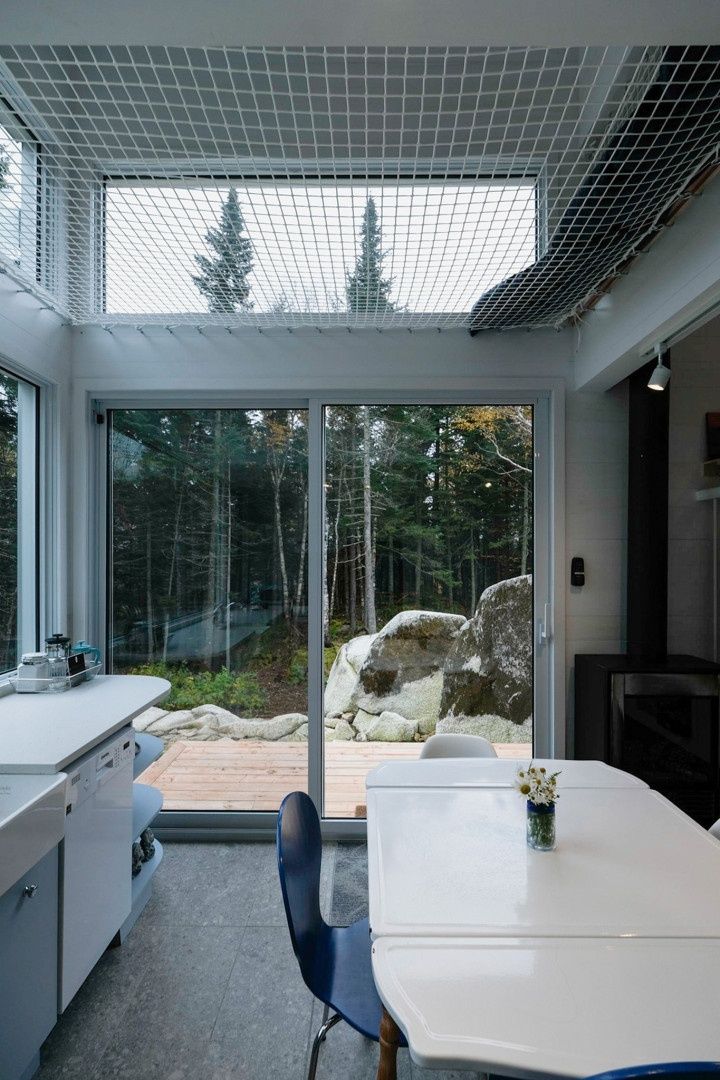 Dining Room from a Tiny Houses project near Quebec City - Levis by Julie Poisson architecte