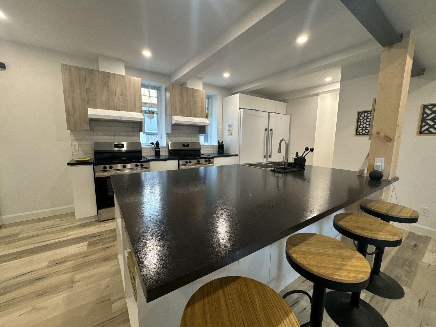 Cocina de un proyecto de tipo Edificios de departamentos y rascacielos cerca de Ciudad de Quebec - Lévis por Groupe Habitech