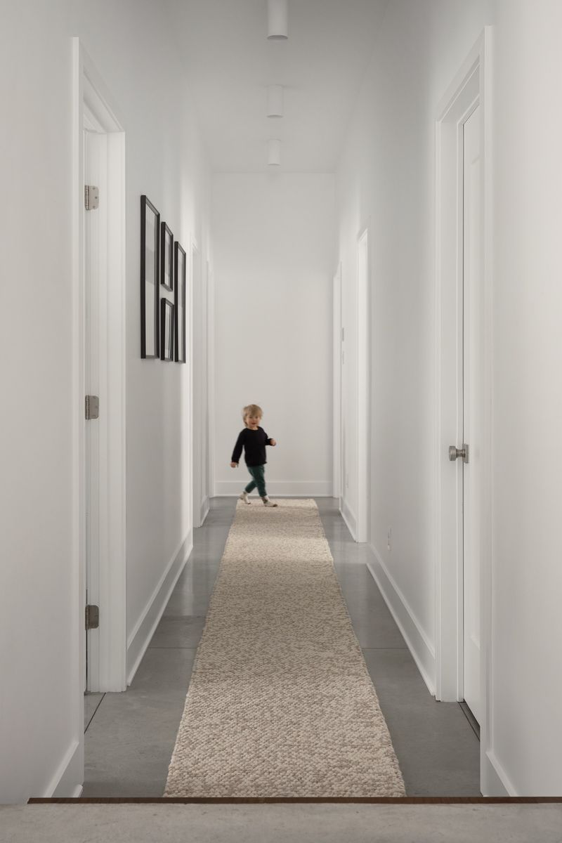 Pasillo interior de un proyecto de tipo Viviendas unifamiliares cerca de Montreal (Gran Montreal) por Écorce architecture écologique