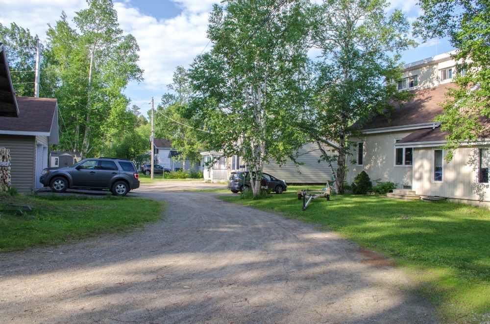 Shared yard from a Septic tanks and drain fields project near Abitibi-Témiscamingue by DBO Expert