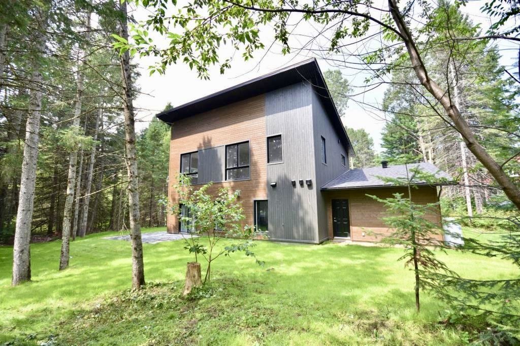 Patio trasero de un proyecto de tipo Viviendas unifamiliares cerca de Saint-Jérôme (Laurentides) por Toundra construction