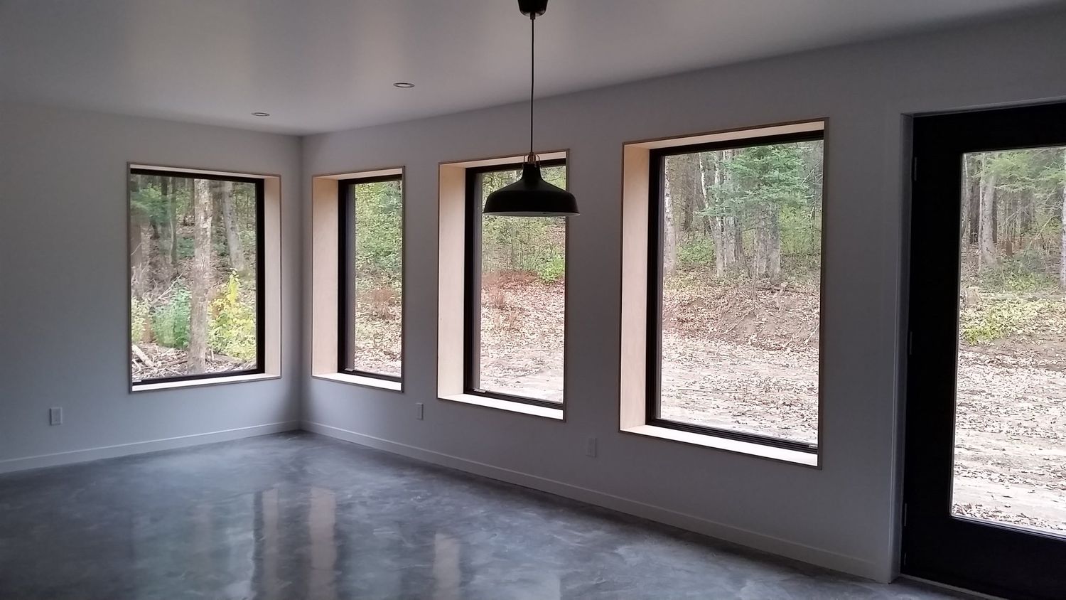 Sala de un proyecto de tipo Viviendas unifamiliares cerca de Drummondville (Centre-du-Québec) por McClure Construction