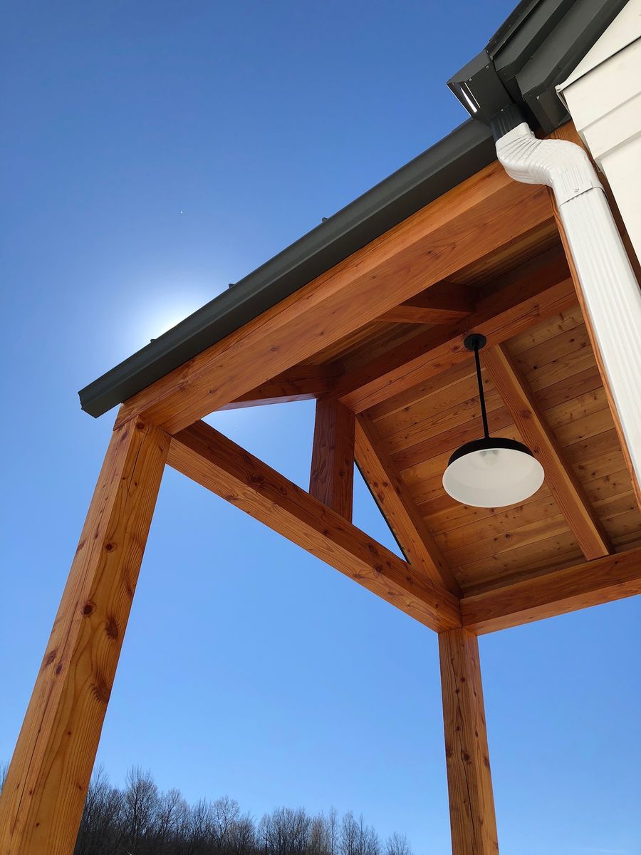 Porch from a Solid wood frames project near Sherbrooke (Estrie) by Noble Élément Structure