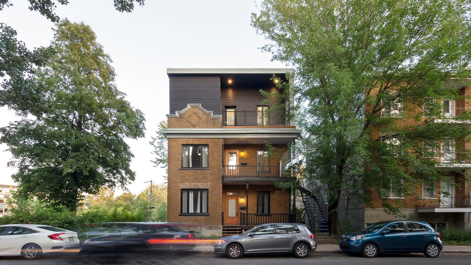 House Exterior from a Second Floor Additions project near Quebec City - Levis by Quinzhee Architecture