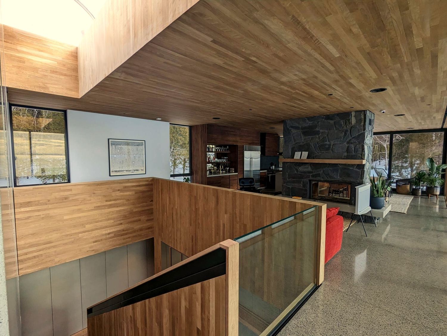 Sala de un proyecto de tipo Viviendas unifamiliares cerca de Saguenay - Lac-Saint-Jean por Solutions Résidentielles