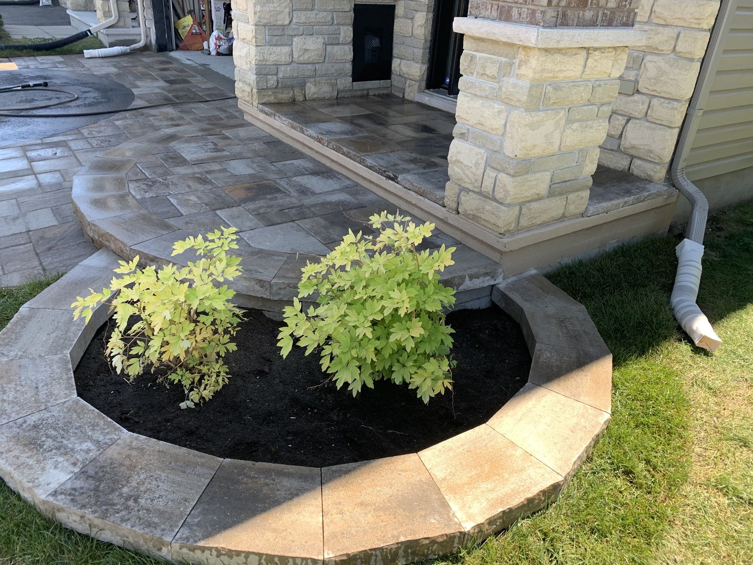 Garden from a Landscaping around a pool project near Ottawa by Zilite Solutions
