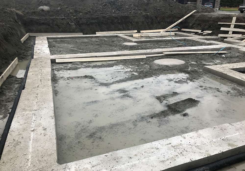 Footings are rarely if ever sealed against ground moisture, so they continually absorb moisture from the ground and deposit it into walls where it leads to mold and rotting walls. 