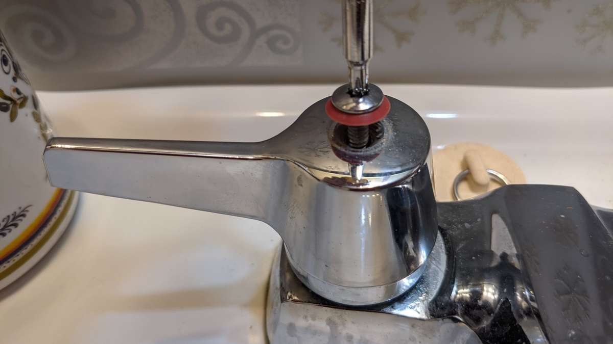 Firstly unscrew the levers off the leaking faucet