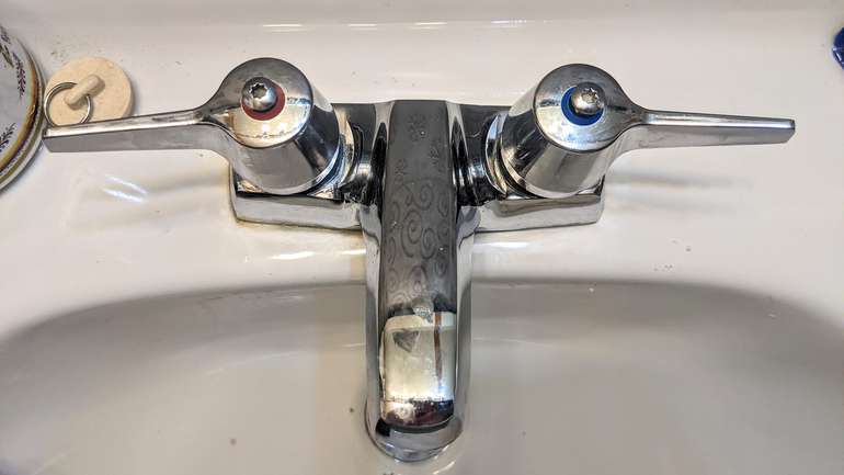 This is where the DIY repaired quarter turn faucet levers are when the taps are fully closed