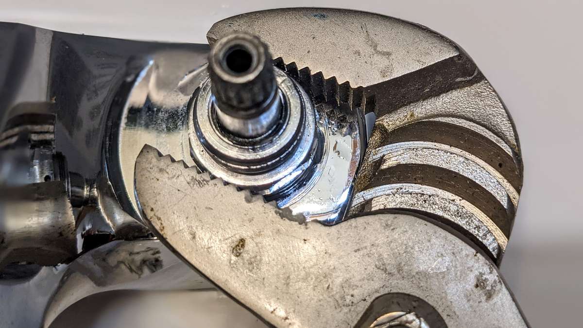 Carefully screw the repaired faucet cartridge back into the tap body - sure hope this fixes the drips!