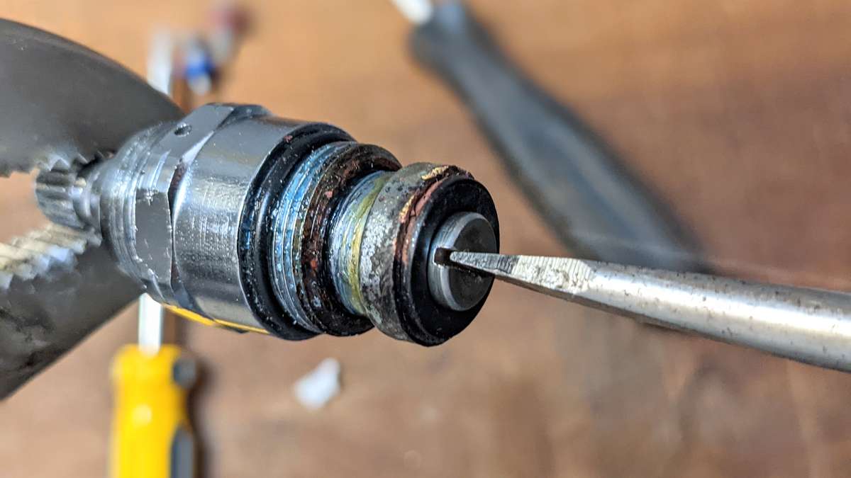 Once the new tap washer is seated all the way remove the metal washer and replace the Bibb screw tightly
