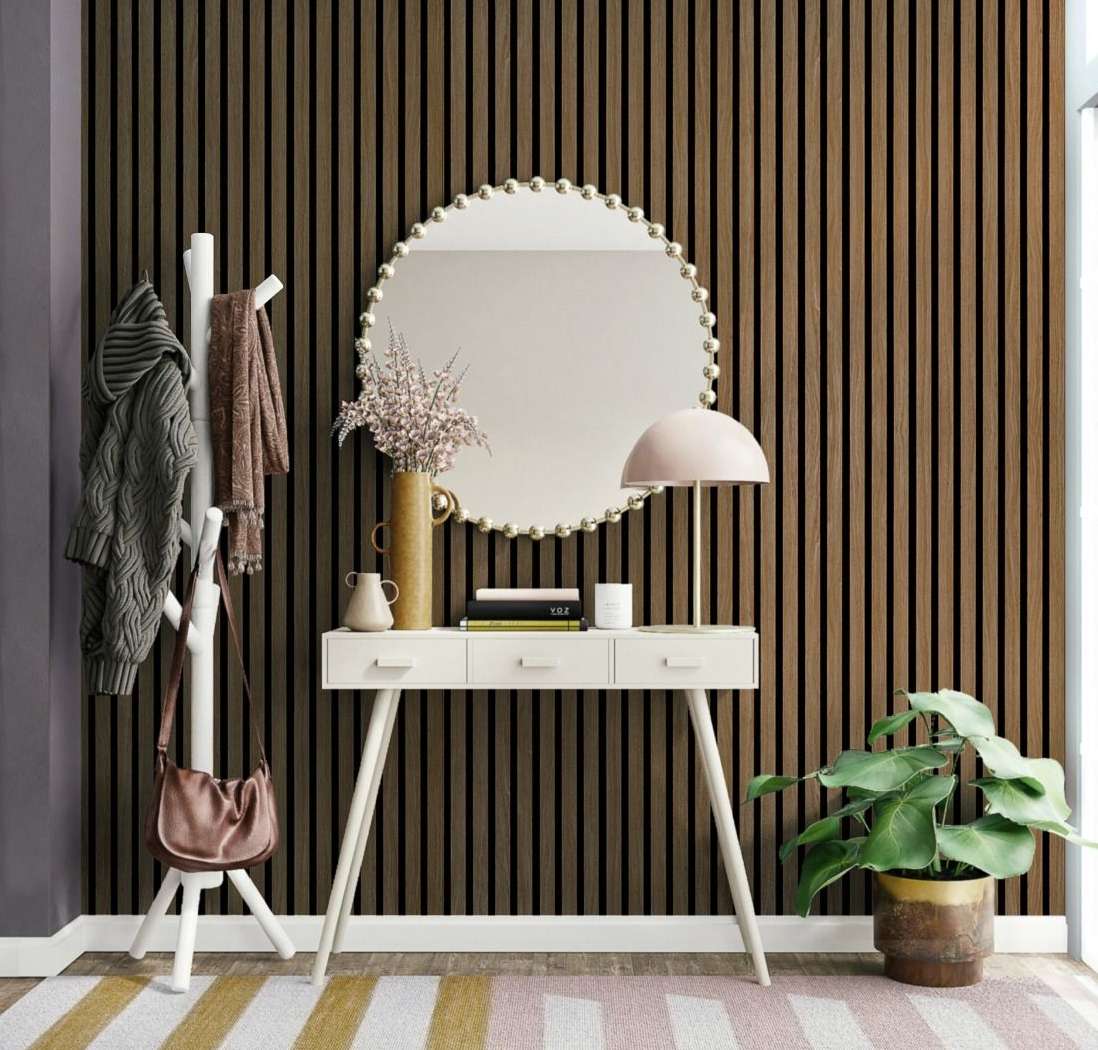Wooden acoustic panel on the wall of a home to reduce sound transmission