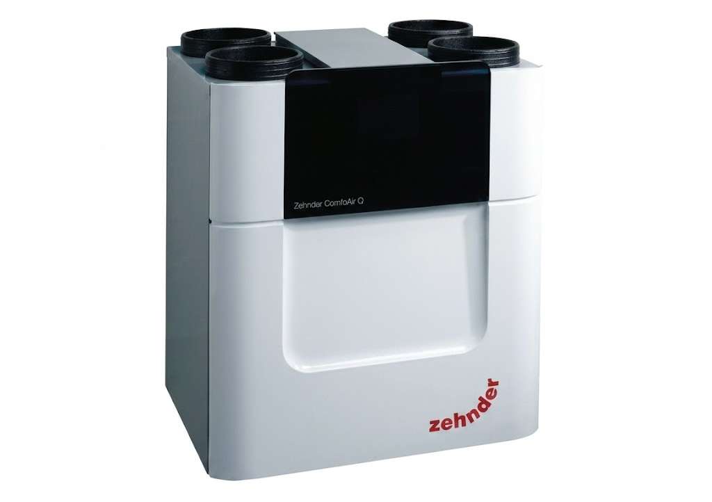 A premium Zehnder ComfoAir Q mechanical ventilation unit installed on a wall with air filters partially extended
