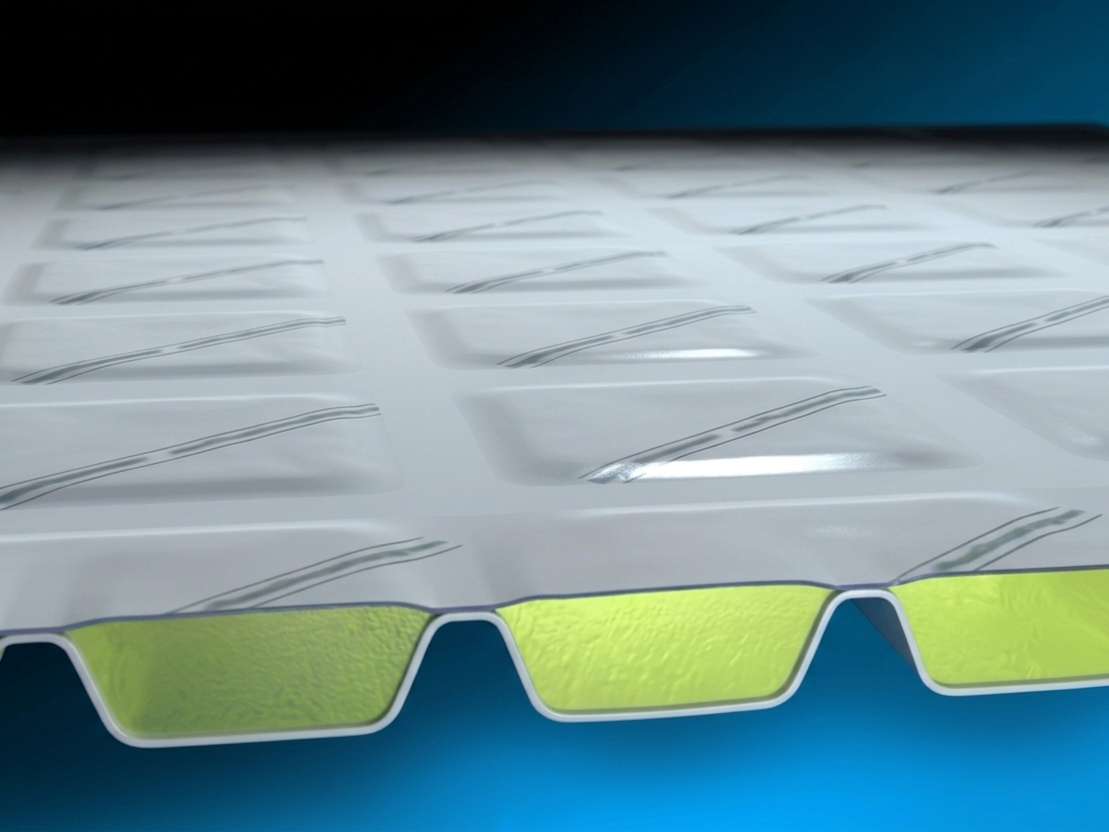 A roll of aluminum-encapsulated phase change material thermal blanket designed for residential building installation