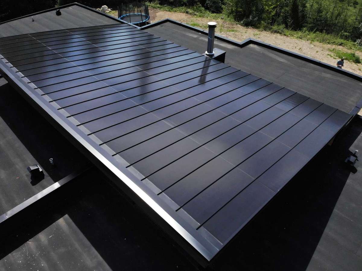BIPV  on a shed roof that looks like a metal roofing